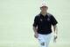 AUGUSTA, GA - APRIL 13: Louis Oosthuizen of South Africa on the first green during the final round of the 2014 Masters Tournament at Augusta National Golf Club on April 13, 2014 in Augusta, Georgia. (Photo by Andrew Redington/Getty Images)