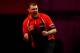 LONDON, ENGLAND - DECEMBER 27: Wes Newton of England celebrates winning a set during his third round match against Robert Thornton of Scotland on day twelve of the Ladbrokes.com World Darts Championship at Alexandra Palace on December 27, 2013 in London,