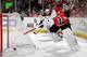 NEWARK, NJ - APRIL 13: Martin Brodeur #30 of the New Jersey Devils shoots the puck away from the net during the third period against the Boston Bruins at the Prudential Center on April 13, 2014 in Newark, New Jersey. The Devils defeated the Bruins 3-2. (P