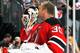 NEWARK, NJ - APRIL 13: Martin Brodeur #30 of the New Jersey Devils kisses his helmet for good luck prior to the start of the game against the Boston Bruins at the Prudential Center on April 13, 2014 in Newark, New Jersey. (Photo by Andy Marlin/NHLI via Ge