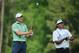 AUGUSTA, GA - APRIL 13: Jordan Spieth of the United States watches his tee shot on the 12th hole as Bubba Watson looks on during the final round of the 2014 Masters Tournament at Augusta National Golf Club on April 13, 2014 in Augusta, Georgia. (Photo by