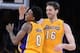 Dec 20, 2013; Los Angeles, CA, USA; Los Angeles Lakers small forward Nick Young (0) celebrates a 3-point basket by center Pau Gasol (16) in the second half of the game against the Minnesota Timberwolves at Staples Center. The Lakers won 104-91. Mandatory