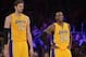 Dec 10, 2013; Los Angeles, CA, USA; Los Angeles Lakers forward Pau Gasol (16) and guard Kobe Bryant (24) react during the game against the Phoenix Suns at Staples Center. The Suns defeated the Lakers 114-108. Mandatory Credit: Kirby Lee-USA TODAY Sports