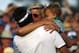 Apr 13, 2014; Augusta, GA, USA; Bubba Watson hugs wife Angie Watson and son Caleb Watson after winning the 2014 The Masters golf tournament at Augusta National Golf Club. Mandatory Credit: Jack Gruber-USA TODAY Sports