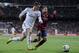 MADRID, SPAIN - MARCH 23: Gareth Bale (L) of Real Madrid takes on Jordi Alba of Barcelona during the La Liga match between Real Madrid CF and FC Barcelona at the Bernabeu on March 23, 2014 in Madrid, Spain. (Photo by Denis Doyle/Getty Images)