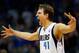 DALLAS, TX - APRIL 12: Dirk Nowitzki #41 of the Dallas Mavericks reacts after making a three point shot against the Phoenix Suns in the third quarter at American Airlines Center on April 12, 2014 in Dallas, Texas. (Photo by Tom Pennington/Getty Images)