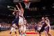 PORTLAND, OR - APRIL 4: Markieff Morris #11 of the Phoenix Suns shoots against Robin Lopez #42 of the Portland Trail Blazers on April 4, 2014 at the Moda Center Arena in Portland, Oregon. NOTE TO USER: User expressly acknowledges and agrees that, by downl