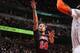 CHICAGO, IL - MARCH 2: D.J. Augustin #14 of the Chicago Bulls shoots against the New York Knicks on March 02, 2014 at the United Center in Chicago, Illinois. NOTE TO USER: User expressly acknowledges and agrees that, by downloading and or using this Photo