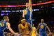 Apr 11, 2014; Los Angeles, CA, USA; Los Angeles Lakers forward Jordan Hill (27) loses control of the ball as Golden State Warriors center Andrew Bogut (12) defends at Staples Center. Mandatory Credit: Richard Mackson-USA TODAY Sports
