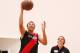 Point guard Dante Exum goes up for a layup.