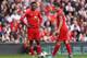 LIVERPOOL, ENGLAND - MARCH 30: Luis Suarez (R) and Daniel Sturridge of Liverpool prepare to kick off during the Barclays Premier League match between Liverpool and Tottenham Hotspur at Anfield on March 30, 2014 in Liverpool, England. (Photo by Alex Live