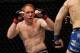 Apr 21, 2012; Atlanta, GA, USA; Mark Bocek (left) fights John Alessio in a lightweight bout during UFC 145 at Philips Arena. Mark Bocek won by a unanimous decision. Mandatory Credit: Paul Abell-USA TODAY Sports