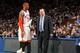 NEW YORK, NY - APRIL 12: Head coach Tom Thibodeau of the Chicago Bulls talks to Carmelo Anthony #7 of the New York Knicks during a game on April 12, 2011 at Madison Square Garden in New York City. NOTE TO USER: User expressly acknowledges and agrees th