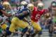 Apr 12, 2014; Notre Dame, IN, USA; Notre Dame Fighting Irish quarterback Everett Golson (5) hands the ball off in the first quarter of the Blue-Gold game at Notre Dame Stadium. Mandatory Credit: Matt Cashore-USA TODAY Sports