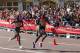 LONDON, ENGLAND - APRIL 13: Edna Kiplagat of Kenya leads Florence Kiplagat of Kenya as they pass Buckingham Palace during the Virgin London Marathon on April 13, 2014 in London, England. (Photo by Miles Willis/Getty Images)