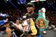 LAS VEGAS, NV - SEPTEMBER 14: Floyd Mayweather Jr. celebrates his majority decision victory against Canelo Alvarez in their WBC/WBA 154-pound title fight at the MGM Grand Garden Arena on September 14, 2013 in Las Vegas, Nevada. (Photo by Al Bello/Getty
