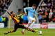 HULL, ENGLAND - MARCH 15: Javi Garcia of Manchester City is tackled by Tom Huddlestone of Hull City during the Barclays Premier league match between Hull City and Manchester City at KC Stadium on March 15, 2014 in Hull, England. (Photo by Paul Thomas/Ge