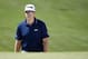 Apr 10, 2014; Augusta, GA, USA; Hunter Mahan walks up to the 7th green during the first round of the 2014 The Masters golf tournament at Augusta National Golf Club. Mandatory Credit: Jack Gruber-USA TODAY Sports