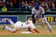 BOSTON, MA - APRIL 7: Daniel Nava #29 of the Boston Red Sox breaks up a double play attempt as Elvis Andrus #1 of the Texas Rangers covers second base in the first inning at Fenway Park on April 7, 2014 in Boston, Massachusetts. (Photo by Jim Rogash/Gett