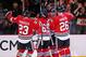 CHICAGO, IL - APRIL 09: (L-R) Kris Versteeg #23, Andrew Shaw #65, Marian Hossa #81, Patrick Sharp #10 and Michal Handzus #26 of the Chicago Blackhawks celebrate Hossa's game-tying goal in the third period against the Montreal Canadiens at the United Cent