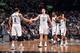 BROOKLYN, NY - APRIL 13: Deron Williams #8, Mirza Teletovic #33 of the Brooklyn Nets slap hands during a game against the Orlando Magic on April 13, 2014 at the Barclays Center in Brooklyn, New York. NOTE TO USER: User expressly acknowledges and agrees th