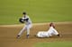 ST. LOUIS - OCTOBER 9: Center fielder Jim Edmonds #15 of the St. Louis Cardinals tries to break up a double play as he slides into second baseman Jeff Kent #21 of the San Francisco Giants in Game one of the National League Championship Series during the