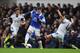 LIVERPOOL, ENGLAND - MARCH 22: Ross Barkley of Everton takes on Jose Alberto Canas (L) and Chico of Swansea City during the Barclays Premier League match between Everton and Swansea City at Goodison Park on March 22, 2014 in Liverpool, England. (Photo by
