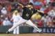 CINCINNATI, OH - APRIL 14: Wandy Rodriguez #51 of the Pittsburgh Pirates pitches in the second inning of the game against the Cincinnati Reds at Great American Ball Park on April 14, 2014 in Cincinnati, Ohio. (Photo by Joe Robbins/Getty Images)