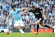 MANCHESTER, ENGLAND - MARCH 09: Sergio Aguero of Manchester City battles with James McArthur of Wigan Athletic during the FA Cup Quarter-Final match between Manchester City and Wigan Athletic at the Etihad Stadium on March 9, 2014 in Manchester, England
