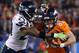 EAST RUTHERFORD, NJ - FEBRUARY 02: Wide receiver Wes Welker #83 of the Denver Broncos tries to avoid the tackle of free safety Earl Thomas #29 of the Seattle Seahawks during Super Bowl XLVIII at MetLife Stadium on February 2, 2014 in East Rutherford, New
