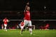LONDON, ENGLAND - APRIL 15: Lukas Podolski of Arsenal celebrates as he scores their third goal during the Barclays Premier League match between Arsenal and West Ham United at Emirates Stadium on April 15, 2014 in London, England. (Photo by Paul Gilham/G
