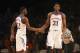 Nov 30, 2013; Paradise Island, BAHAMAS; Kansas Jayhawks guard Andrew Wiggins (22) and center Joel Embiid (21) react after a score during the game against the UTEP Miners at the 2013 Battle 4 Atlantis in the Imperial Arena at the Atlantis Resort. Mandatory