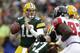 GREEN BAY, WI - DECEMBER 08: Matt Flynn #10 of the Green Bay Packers drops back to pass the football during the first half of play against the Atlanta Falcons at Lambeau Field on December 08, 2013 in Green Bay, Wisconsin. (Photo by Mike McGinnis/Getty Ima