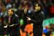 LIVERPOOL, ENGLAND - JANUARY 28: Roberto Martinez the Everton manager directs his players as Brendan Rodgers the Liverpool manager reacts during the Barclays Premier League match between Liverpool and Everton at Anfield on January 28, 2014 in Liverpool,