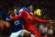 LIVERPOOL, ENGLAND - JANUARY 28: Daniel Sturridge of Liverpool attempts to control the ball under pressure from John Stones of Everton during the Barclays Premier League match between Liverpool and Everton at Anfield on January 28, 2014 in Liverpool, Eng