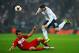 LONDON, ENGLAND - OCTOBER 15: Wayne Rooney of England hurdles the challenge from Grzegorz Krychowiak of Poland during the FIFA 2014 World Cup Qualifying Group H match between England and Poland at Wembley Stadium on October 15, 2013 in London, England.