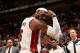 MIAMI, FL - April 11: LeBron James #6 of the Miami Heat flexes during the game against the Indiana Pacers at the American Airlines Arena in Miami, Florida on April 11, 2014. NOTE TO USER: User expressly acknowledges and agrees that, by downloading and/o