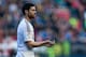 PAMPLONA, SPAIN - DECEMBER 14: Xabi Alonso of Real Madrid CF gives instructions to their teammates during the La Liga match between CA Osasuna and Real Madrid CF at Estadio El Sadar de Navarra on December 14, 2013 in Pamplona, Spain. (Photo by Gonzalo Ar