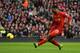LIVERPOOL, ENGLAND - FEBRUARY 23: Daniel Sturridge of Liverpool scores the first goal during the Barclays Premier League match between Liverpool and Swansea City at Anfield on February 23, 2014 in Liverpool, England. (Photo by Clive Brunskill/Getty Imag