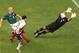 Donovan scores against Mexico at the 2002 World Cup.