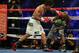 LAS VEGAS, NV - APRIL 12: Manny Pacquiao throws a left hand at Timothy Bradley at the MGM Grand Garden Arena on April 12, 2014 in Las Vegas, Nevada. (Photo by Jeff Gross/Getty Images)