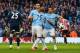 MANCHESTER, ENGLAND - APRIL 16: Fernandinho of Manchester City celebrates after scoring the first goal with Sergio Aguero and Alvaro Negredo of Manchester City during the Barclays Premier League match between Manchester City and Sunderland at Etihad Sta