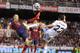 VALENCIA, SPAIN - APRIL 16: Andres Iniesta (L) of FC Barcelona battles for the ball against Angel Di Maria of Real Madrid during the Copa del Rey Final between Real Madrid and Barcelona at Estadio Mestalla on April 16, 2014 in Valencia, Spain. (Photo b