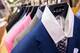 Suits designed by Alba on display in her L.A. manufacturing headquarters.