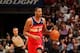 MIAMI, FL - March 10: Trevor Ariza #1 of the Washington Wizards dribbles up the court against the Miami Heat at the American Airlines Arena in Miami, Florida on March 10 2014. NOTE TO USER: User expressly acknowledges and agrees that, by downloading and/o