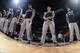 DENVER, CO - MARCH 28: Tim Duncan #21, Manu Ginobili #20 and Tony Parker #9 of the San Antonio Spurs stand on the court before the game against the Denver Nuggets on March 28, 2014 at the Pepsi Center in Denver, Colorado. NOTE TO USER: User expressly ack