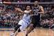 Dec 26, 2013; Dallas, TX, USA; Dallas Mavericks shooting guard Monta Ellis (11) drives to the basket past San Antonio Spurs power forward Boris Diaw (33) during the game at the American Airlines Center. The Spurs defeated the Mavericks 116-107. Mandatory