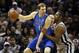 Mar 2, 2014; San Antonio, TX, USA; Dallas Mavericks forward Dirk Nowitzki (41) is defended by San Antonio Spurs forward Boris Diaw (right) during the first half at AT&T Center. Mandatory Credit: Soobum Im-USA TODAY Sports