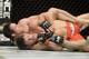 Apr 16, 2014; Quebec City, Quebec, Canada; Michael Bisping (red gloves) fights against Tim Kennedy (blue gloves) during their middleweight bout at Colisee Pepsi. Mandatory Credit: Eric Bolte-USA TODAY Sports