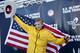 HOUSTON, TX - JANUARY 14: Ryan Hall poses on the winners stage after qualifying at the U.S. Marathon Olympic Trials on January 14, 2012 in Houston, Texas. (Photo by Bob Levey/Getty Images)